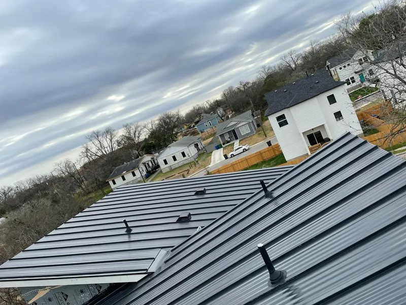 Standing seam metal roof panels with vents for Skylight Repair in Corrales